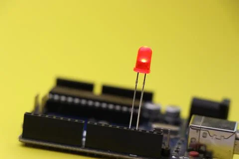 Red led illuminated which is controlled by micro controller board Stock Photos