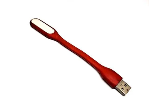Red LED light stick that can be used as a power bank, white background Stock Photos