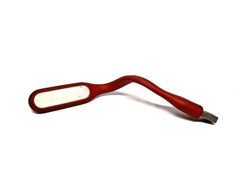Red LED light stick that can be used as a power bank, white background Stock Photos