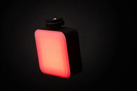 Red LED panel light isolated on black background glowing with vivid illumin.. Stock Photos