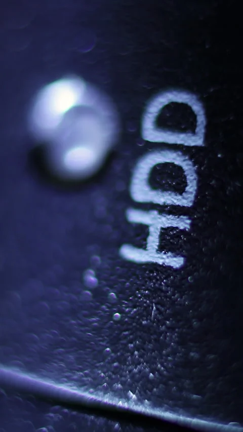 Red LED status lamp blinking through recording data on pc hard drive, close up Stock Footage 267705155