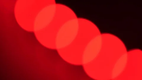 Red Led strip coil closeup. Diode shining stripe on dark red background. Stock Footage 113011622