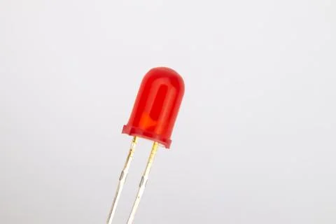 A red LED on a white background. This part is used for DIY electronics for ho Stock Photos