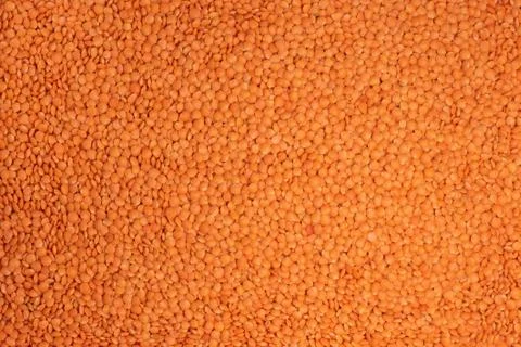 Red lentils background Stock Photos