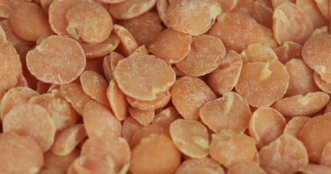 Red lentils closeup rotating selective focus Stock Footage 168612360