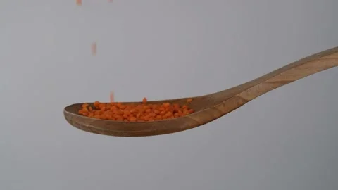 Red lentils slow motion Stock Footage 236447843