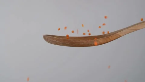 Red lentils slow motion Stock Footage 236450494