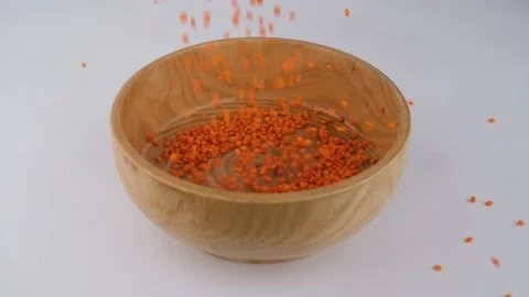Red lentils slow motion Stock Footage 236453266