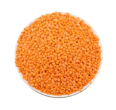 Red Lentils on White Background Foto stock