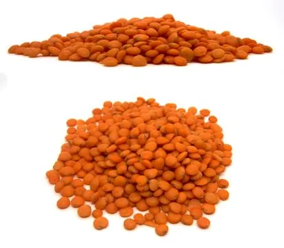 Red lentils on white background - two perspectives Stock Photos