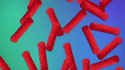 Red Licorice Twists Falling Over Vibrant Gradient Mesh Background Stock Footage 344832220
