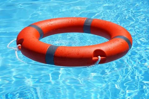 Red lifebuoy pool ring float Foto stock