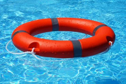 Red lifebuoy pool ring float Foto stock