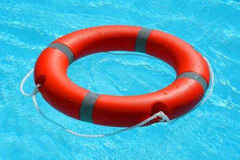 Red lifebuoy pool ring float Foto stock