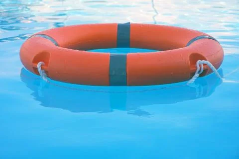 Red lifebuoy pool ring float Stock Photos