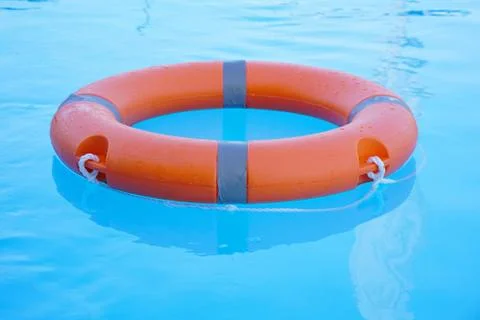Red lifebuoy pool ring float Stock Photos
