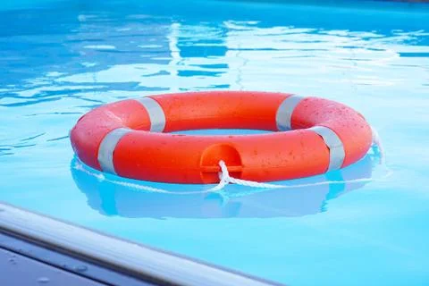 Red lifebuoy pool ring float Stock Photos