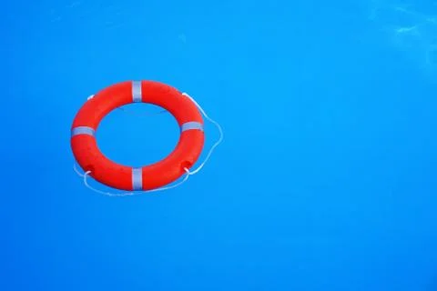 Red lifebuoy pool ring float Stock Photos