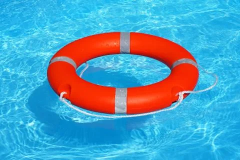Red lifebuoy pool ring float Foto stock
