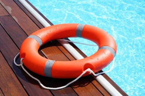 Red lifebuoy pool ring float Foto stock