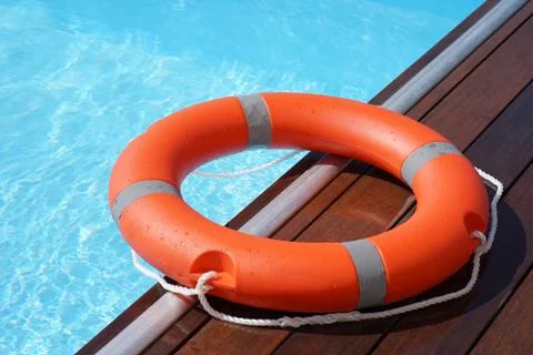Red lifebuoy pool ring float Stock Photos
