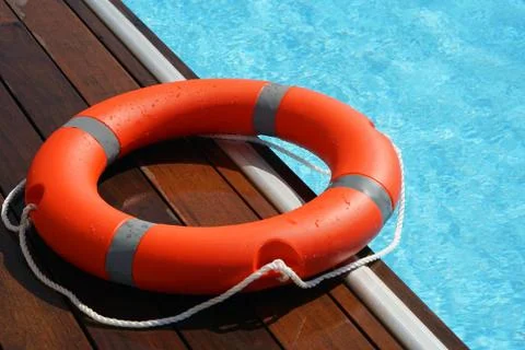 Red lifebuoy pool ring float Stock Photos