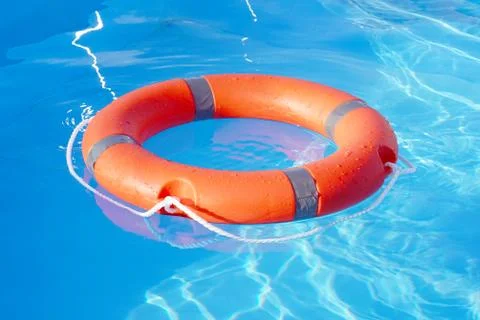 Red lifebuoy pool ring float Foto stock