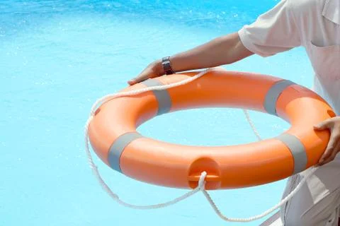 Red lifebuoy pool ring float Stock Photos
