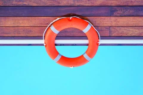 Red lifebuoy pool ring float Stock Photos