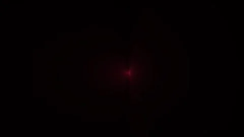 Red light beam motion in dark void creates cinematic atmosphere with pulsin.. 库存影片 335023162