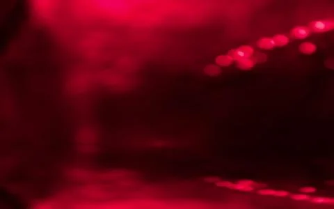 Red light bokeh glitter background. Stock Photos