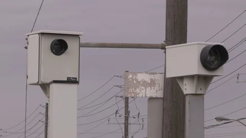 Red light camera watching traffic Stock Video Pond5