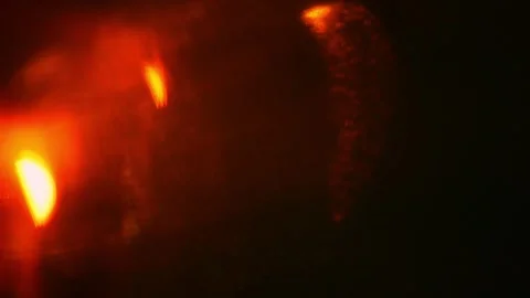 Red light effect on black background. Abstract wallpaper. Analog film effect. 스톡 동영상 330588677