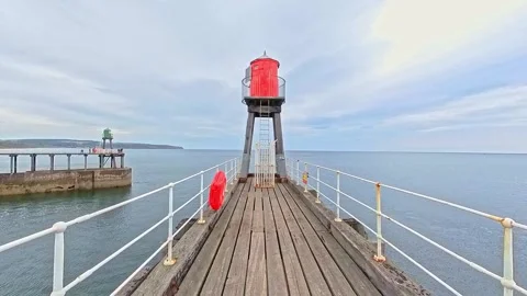 The red light at the end of the pier or jetty in Whitby harbour Stock-Footage 246602250