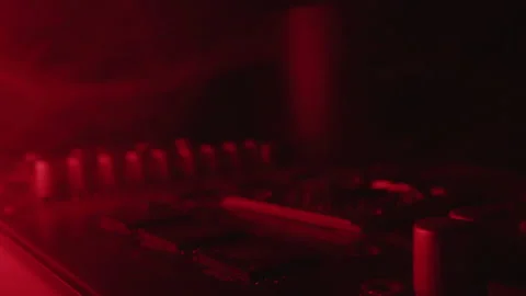 Red light fills the space between the parts of the chip 스톡 동영상 156761915