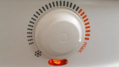 Red light indicator comes on - boiler has turned on to heat water Stock Footage 321559805