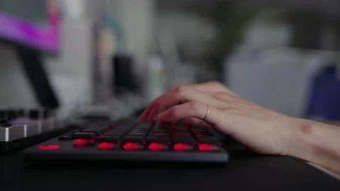 A red light keyboard typing hand. Stock Footage 167006709