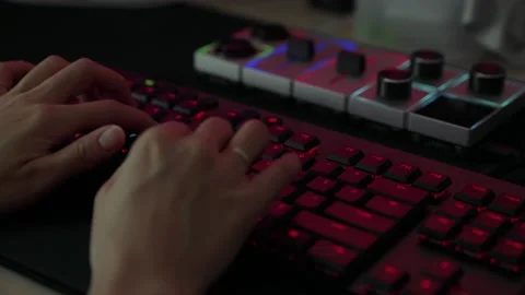 A red light keyboard typing hand. Stock Footage 167006710