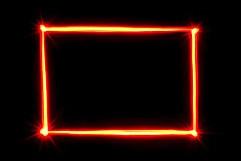 Red light painting rectangle frame on black background Stock Photos
