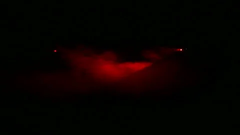 Red light profile spotlights in the dark smoke screen. 库存影片 119924995
