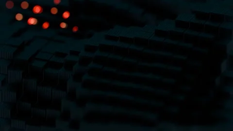 A red light shining on a black background Stock Footage 309924803