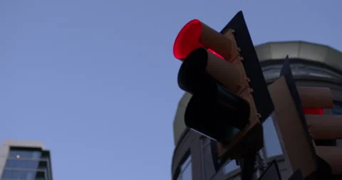 Red Light Stop Light in Traffic Slow Motion Panning Shot Video stock 217763093