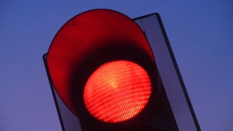 Red light at traffic light at twilight united kingdom Stock Footage 123407846