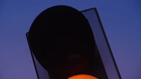 Red light at traffic light at twilight united kingdom Stock Footage 123408123