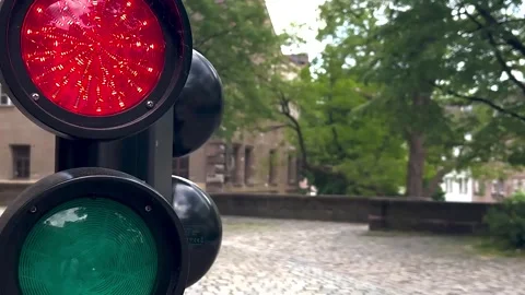 Red light at traffic lights. Electric lights with two colours. Street regulation Stock Footage 274365761
