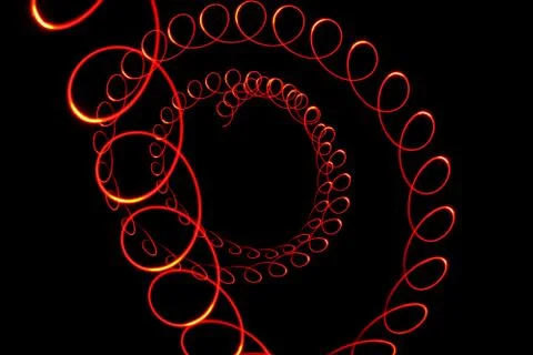 Red light vortex on black Stock Photos