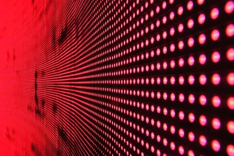 Red light wall in dotted pattern Stock Photos