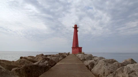 Red Lighthouse and rocks at Pere Marquette, Michigan. 4k60p Stock Footage 128858158