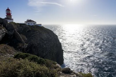 The red lighthouse at Farol do Cabo de Sao Vicente, Portugal Stock Photos