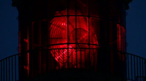 Red lighthouse illuminated Stock Footage 873374